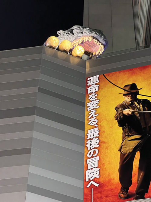 A Godzilla replica appears as if he's ready to take a bite out of Indiana Jones at Tokyo's Toho Cinemas.