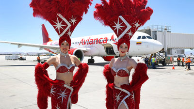 Las Vegas showgirls were on hand for the arrival of the first Avianca flight into Reid Airport on July 15.