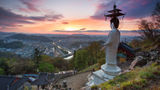 Buddhist statue towers over temple in South Korea, a new destination Contiki will offer in 2024.