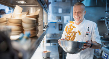 Cunard has inked a partnership with two-Michelin-starred chef Michel Roux.