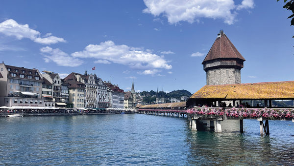 Kapellbrücke, the famous flower-lined wooden footbridge in Lucerne.