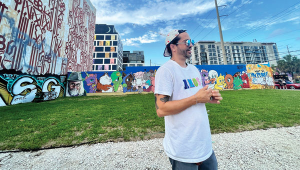 Pedro Amos, owner of Miami's Best Graffiti Guide, leads a tour.