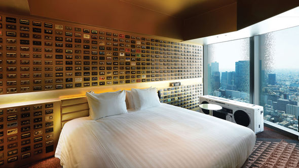 Rooms at the Hotel Groove Shinjuku double as art installations. This one, designed by artist Yoshiaki Kaihatsu, includes a wall of cassettes and an oversize boombox.